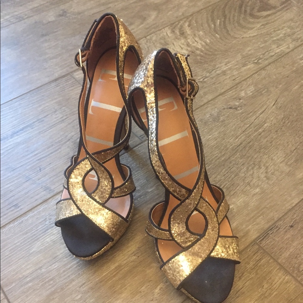 Black and gold high heels